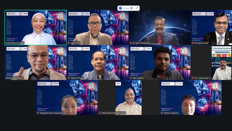 A hybrid session in progress at the 5th WCMRI conference, with presenters and delegates joining online